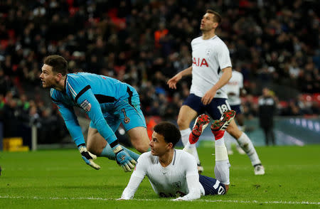 Soccer Football - FA Cup Fourth Round Replay - Tottenham Hotspur vs Newport County - Wembley Stadium, London, Britain - February 7, 2018 Tottenham's Dele Alli looks on as his shot hits the crossbar Action Images via Reuters/Peter Cziborra