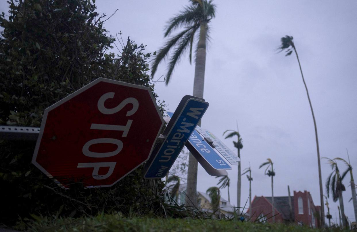 Downed street signs in the aftermath of Hurricane Ian.