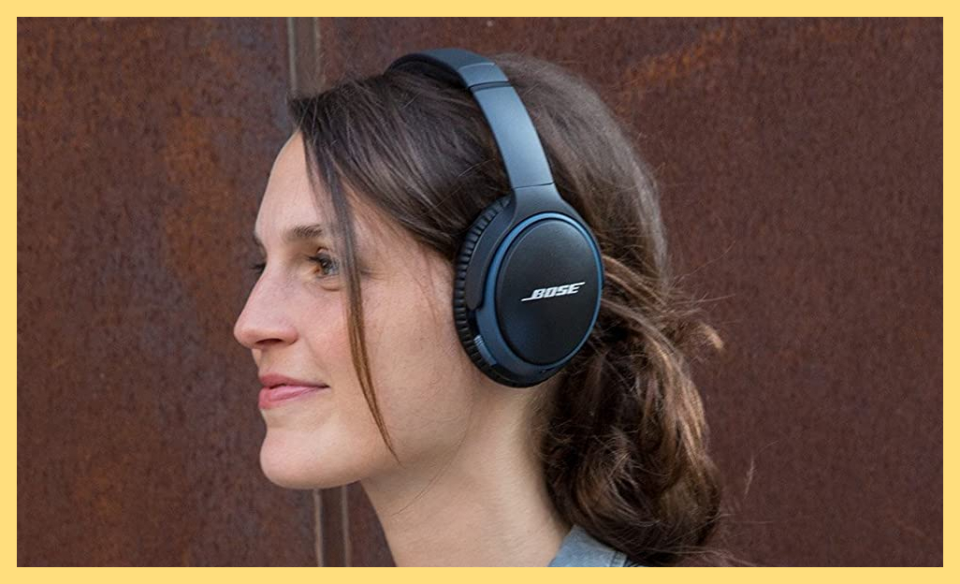 person wearing bose headphones