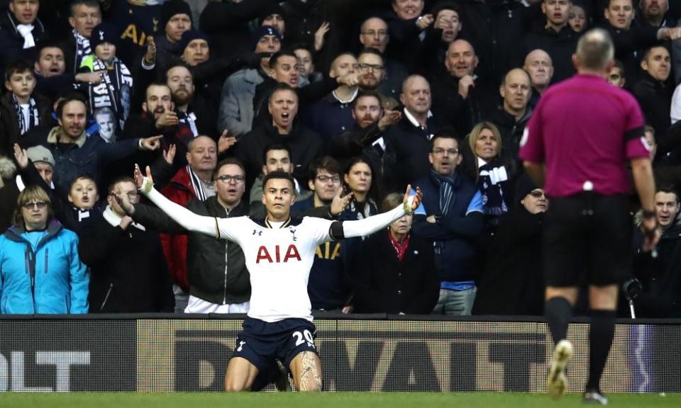 Dele Alli successfully appeals for a penalty against Swansea after going down under Kyle Naughton’s challenge.