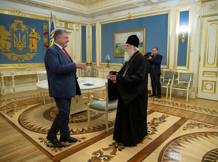 Ukraine's President Petro Poroshenko (L) meets with Patriarch Filaret, head of the Ukrainian Orthodox Church of the Kiev Patriarchate, in Kiev, Ukraine October 11, 2018. Mykhailo Markiv/Ukrainian Presidential Press Service/Handout via REUTERS