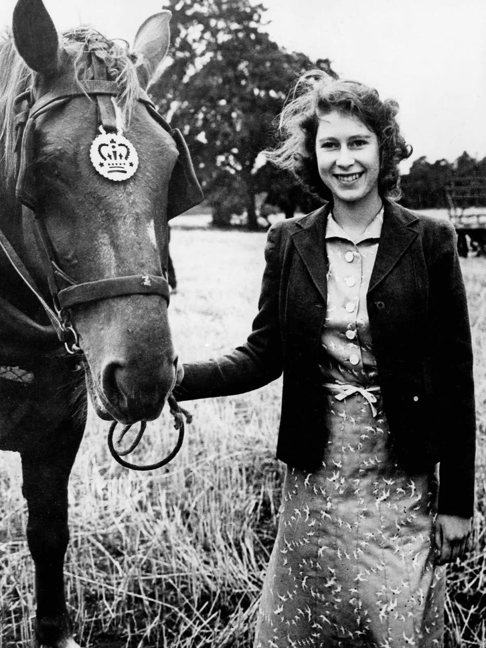 Young Elizabeth with one of her horses (AFP/Getty)