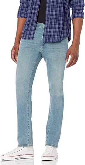 Model wearing slim-fit jeans