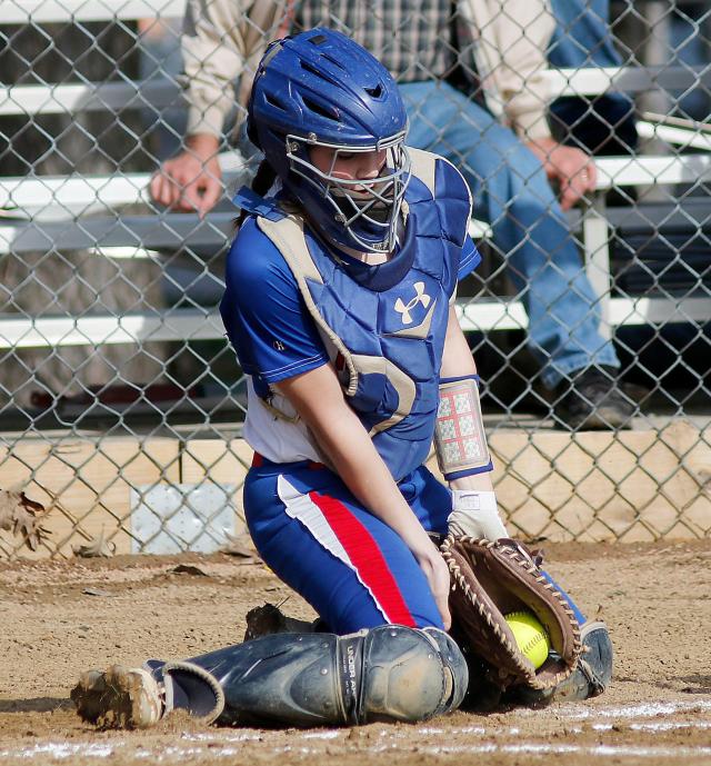 softball catchers in action