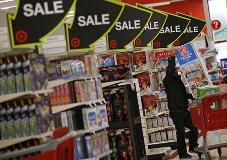 A shopper takes part in Black Friday sales at a Target store in Chicago, Illinois, United States, November 27, 2015. REUTERS/Jim Young - RTX1W5G7