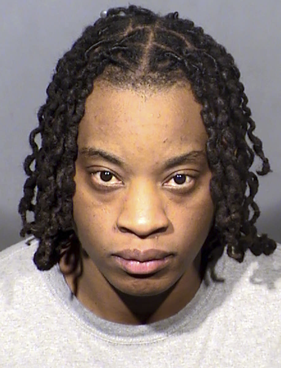 This booking photo released by the Clark County, Nev., Detention Center shows Las Vegas Aces WNBA basketball player Riquna Williams, 33, following her arrest Tuesday, July 25, 2023, on felony domestic violence charges. Williams, a veteran WNBA player and member of last year's championship-winning Las Vegas Aces, has been barred from the team after her arrest on felony domestic violence charges involving a person authorities say is her spouse. A Las Vegas judge said Wednesday the veteran WNBA shooting guard can be freed from jail without bail pending an Aug. 2, 2023, court appearance, but can't contact her alleged victim. (Clark County Detention Center via AP)