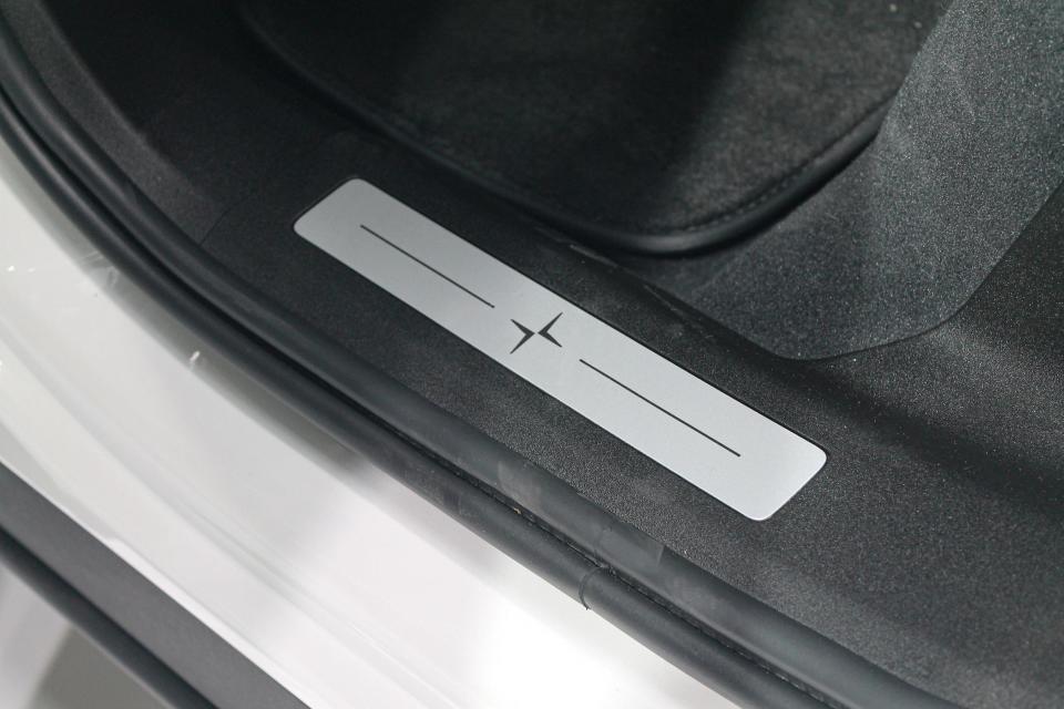 The doorsill of the Polestar 3 electric SUV, featuring a Polestar logo.