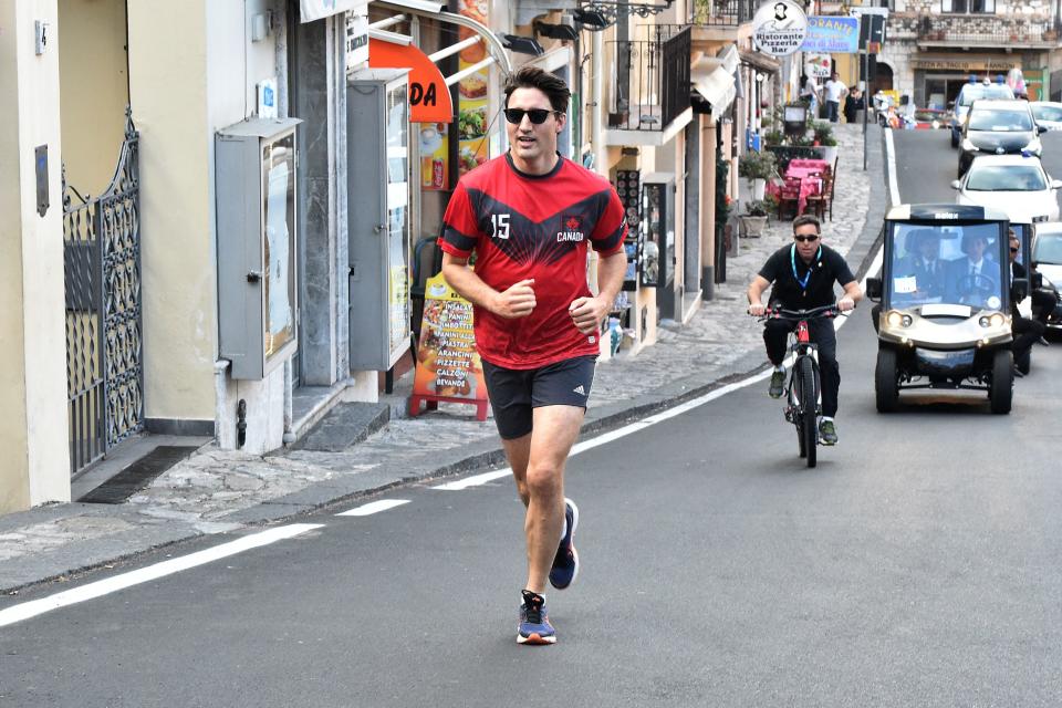 Canadian Prime Minister Justin Trudeau jogs in Taormina after a G7 Summit of Heads of State and of Government, on May 27, 2017 in Sicily. / AFP PHOTO / GIOVANNI ISOLINO        (Photo credit should read GIOVANNI ISOLINO/AFP/Getty Images)