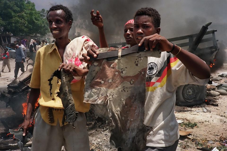 Somalis with US soldiers camouflage in Mogadishu