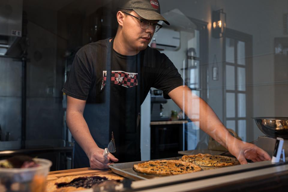 An employee works in the kitchen at the new cafe and restaurant, Café Piro, which opened up in Socorro, Texas, at 9993 Socorro Road.