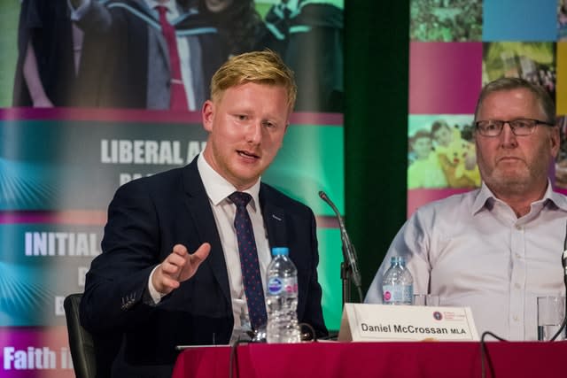 SDLP member Daniel McCrossan (left)