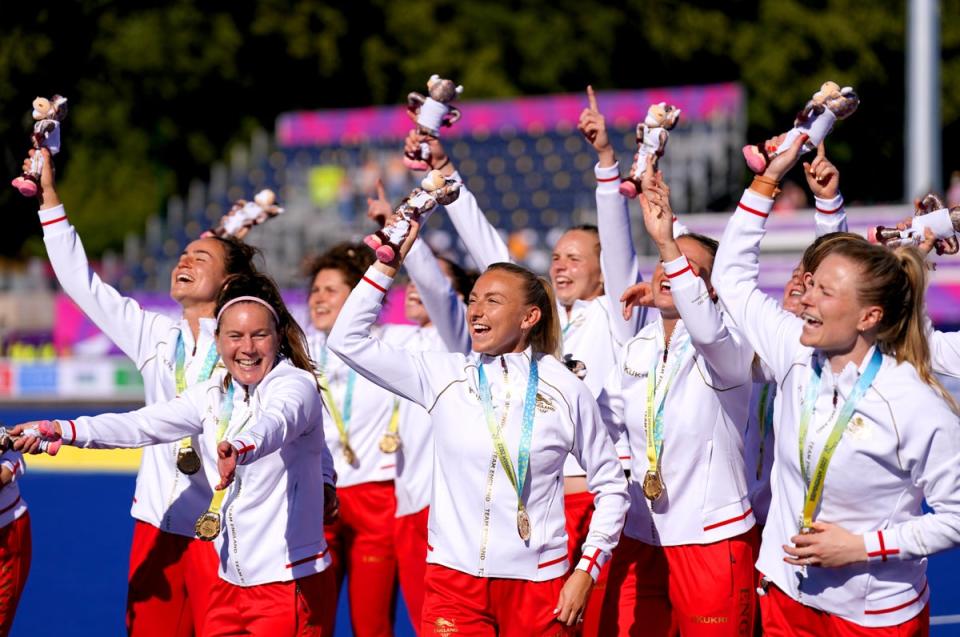 England’s hockey players celebrate with their gold medals at the Commonwealth Games (Joe Giddens/PA) (PA Wire)