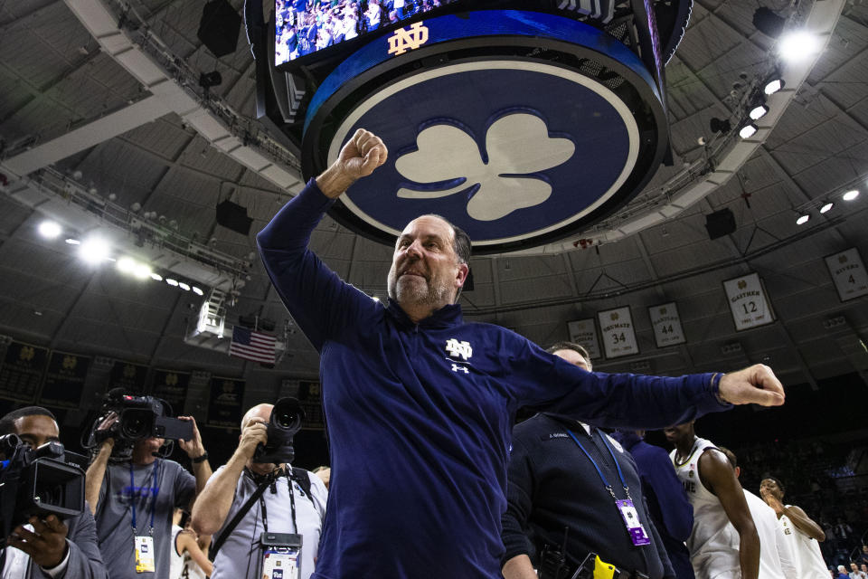 Notre Dame coach Mike Brey celebrates the team's win over Pittsburgh in NCAA college basketball game on March 1, 2023, in South Bend, Indiana. (AP Photo/Michael Caterina)