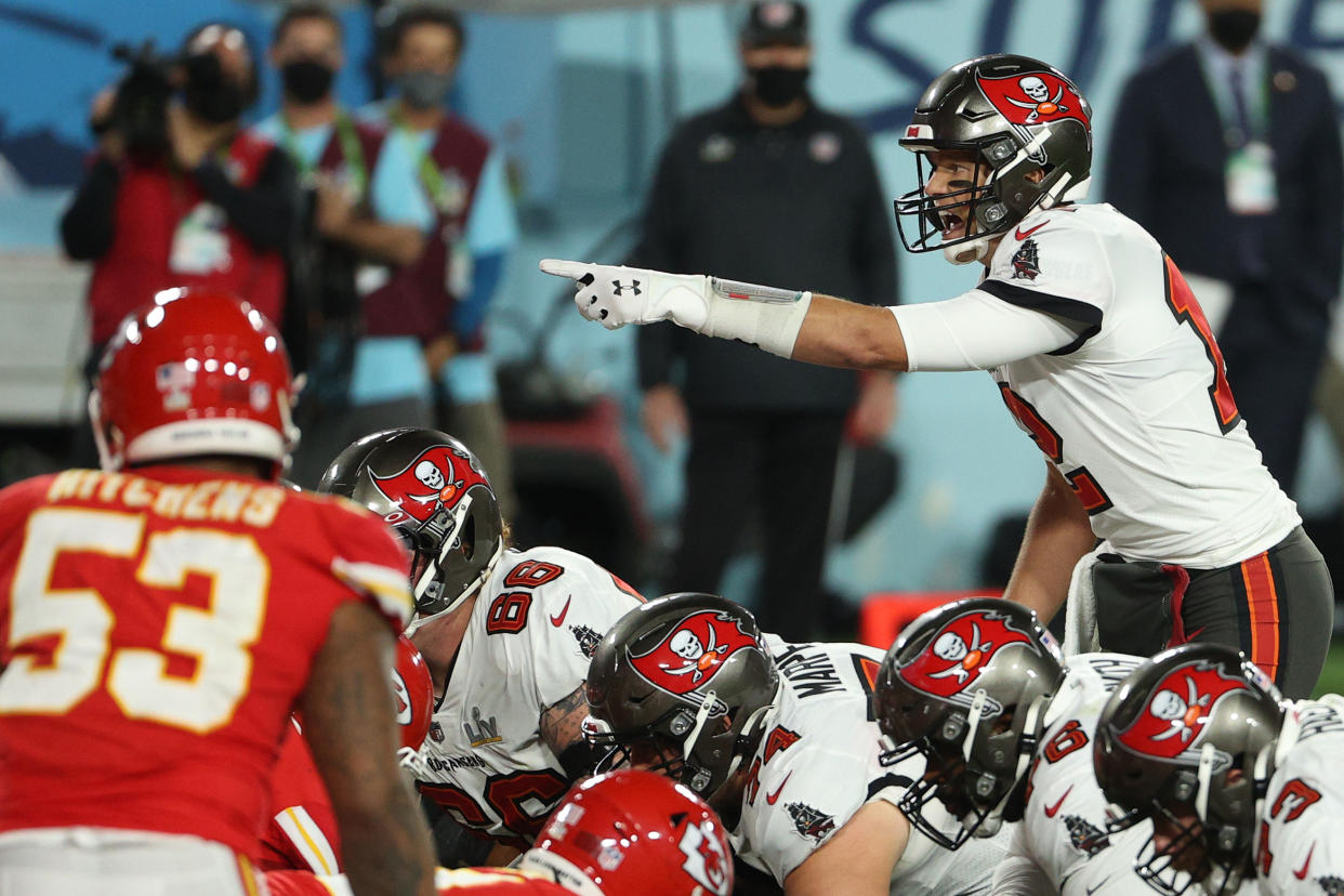 TAMPA, FLORIDA - FEBRUARY 07: Tom Brady #12 of the Tampa Bay Buccaneers signals before a play in the second quarter against the Kansas City Chiefs in Super Bowl LV at Raymond James Stadium on February 07, 2021 in Tampa, Florida. (Photo by Patrick Smith/Getty Images)