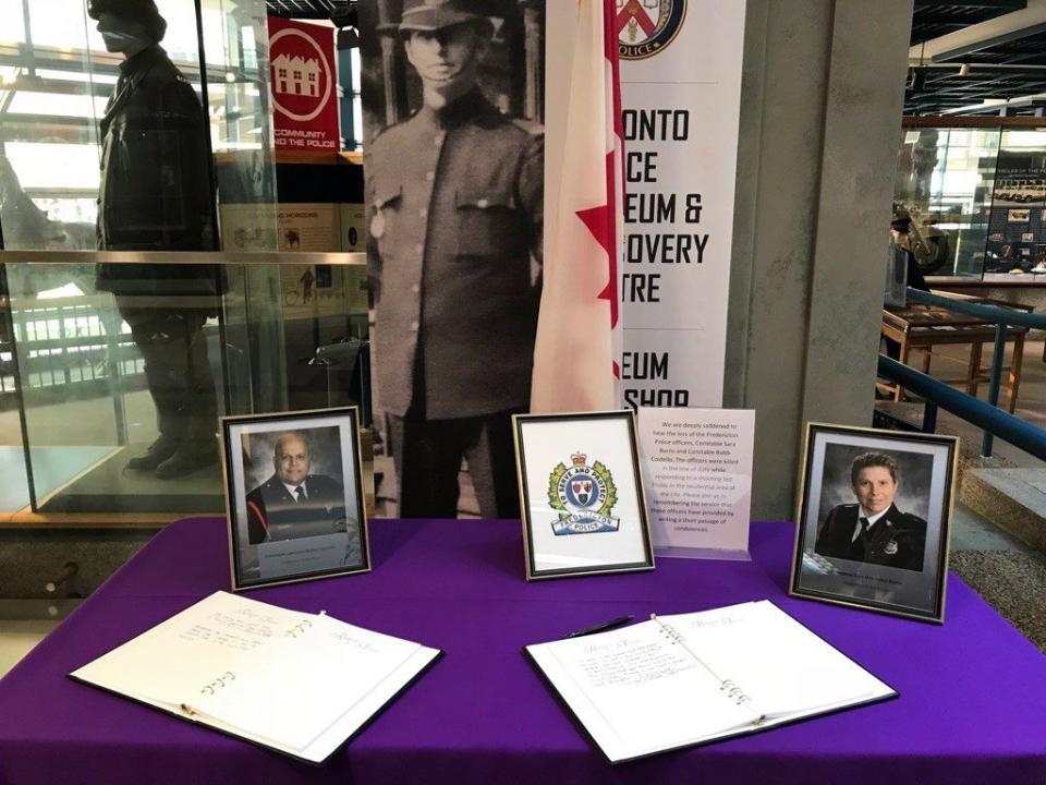 <p>A book of condolences for the families of two officers killed in Fredericton last week is shown at police headquarters in Toronto in this recent handout photo. Toronto police say members of the public can sign books of condolences at the force’s headquarters for the families of two officers killed in Fredericton last week. They say the books will be privately delivered to the families of Const. Robb Costello and Const. Sara Burns. (Photo from The Canadian Press/Toronto Police) </p>