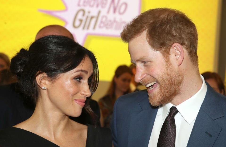 Prince Harry and Meghan Markle share a sweet moment while attending the Women's Empowerment reception at the Commonwealth Heads of Government meeting.