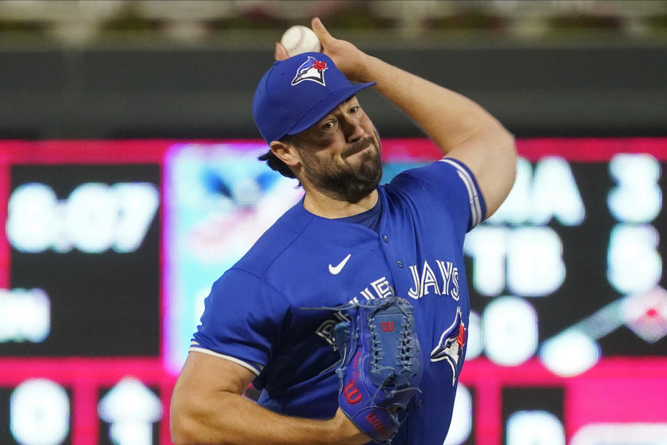 Toronto Blue Jays pitcher Robbie Ray throws against the Minnesota Twins in the first inning of a baseball game, Saturday, Sept. 25, 2021, in Minneapolis. (AP Photo/Jim Mone)