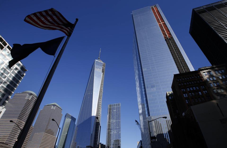 One World Trade Center tower (center) and the soon to be opened 4 World Trade Center tower (right) are seen in New York