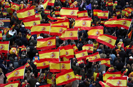 FILE PHOTO: People gather during a protest called by right-wing opposition parties against Spanish Prime Minister Pedro Sanchez at Colon square in Madrid, Spain, February 10, 2019. REUTERS/Sergio Perez/File Photo