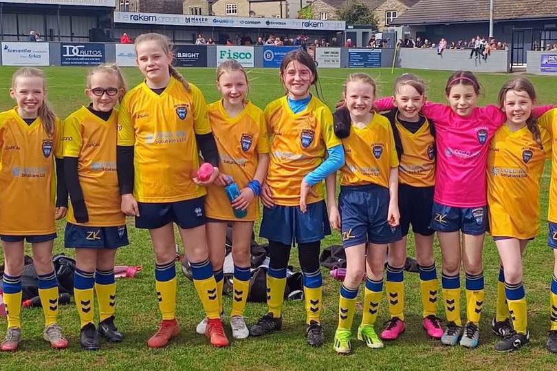The under-10s Woodlanders FC team became the first all-girls team to win the Vase trophy -Credit:Woodlanders FC
