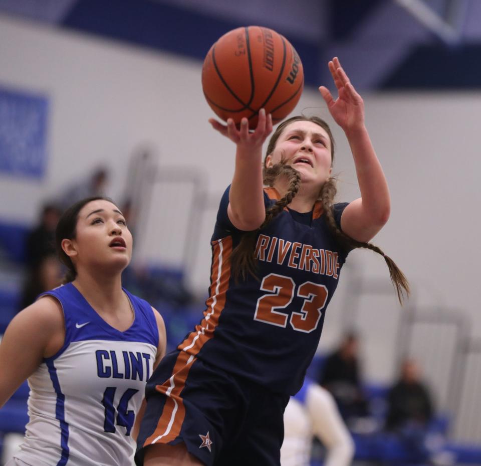 Riverside High School player, Sophiya Bustillos drives in the paint during her teamÕs win on the road against Clint High School 52-44.