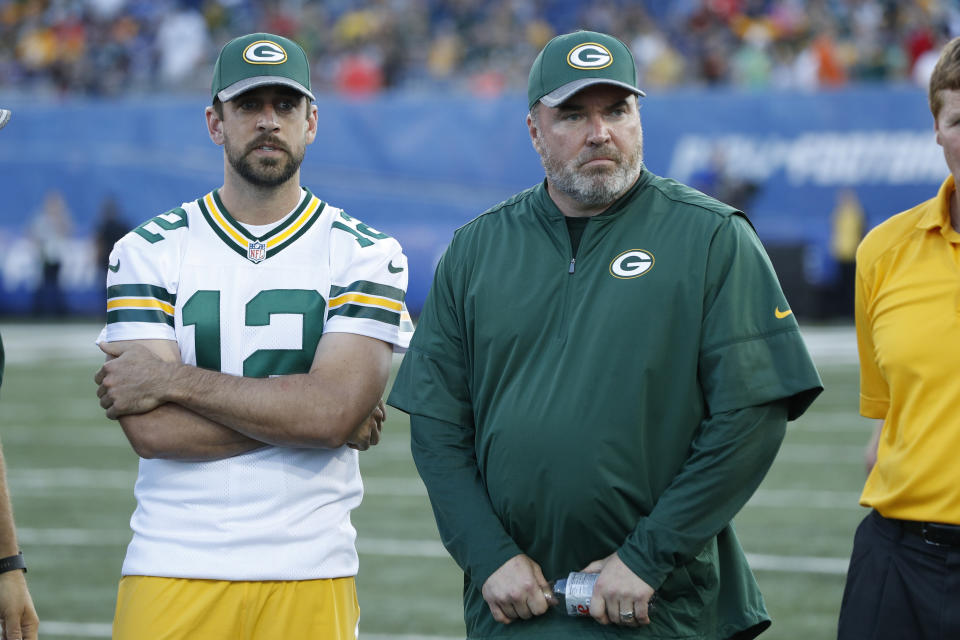 CANTON, OH - AUGUST 07: Aaron Rodgers #12 and head coach Mike McCarthy of the Green Bay Packers look on after the NFL Hall of Fame Game against the Indianapolis Colts was cancelled due to poor field conditions at Tom Benson Hall of Fame Stadium on August 7, 2016 in Canton, Ohio. (Photo by Joe Robbins/Getty Images)