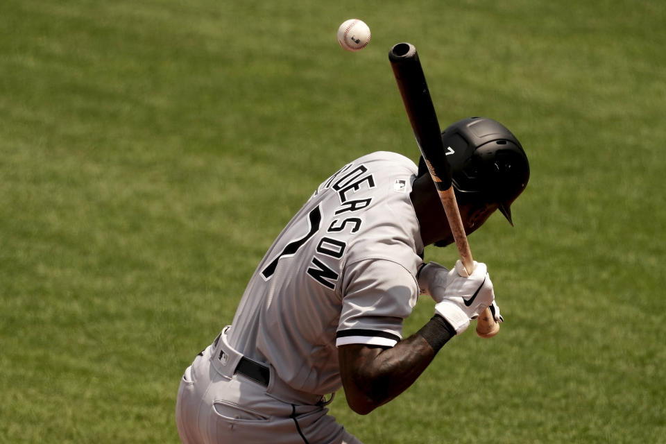 Chicago White Sox's Tim Anderson is hit by a pitch thrown by Kansas City Royals starting pitcher Jonathan Heasley during the fifth inning in the first game of a baseball doubleheader Tuesday, May 17, 2022, in Kansas City, Mo. (AP Photo/Charlie Riedel)