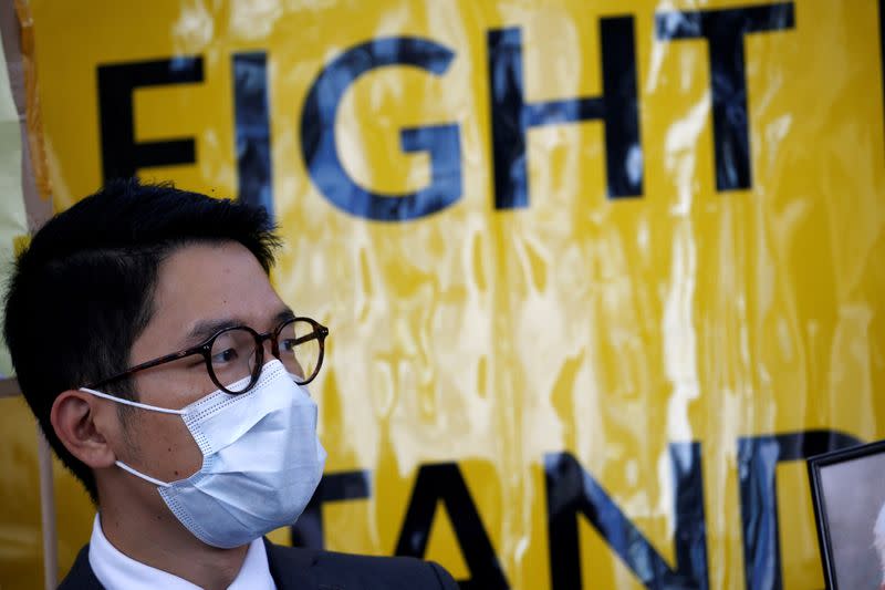 FILE PHOTO: Hong Kong exile pro-democracy activist Nathan Law holds a rally in Berlin