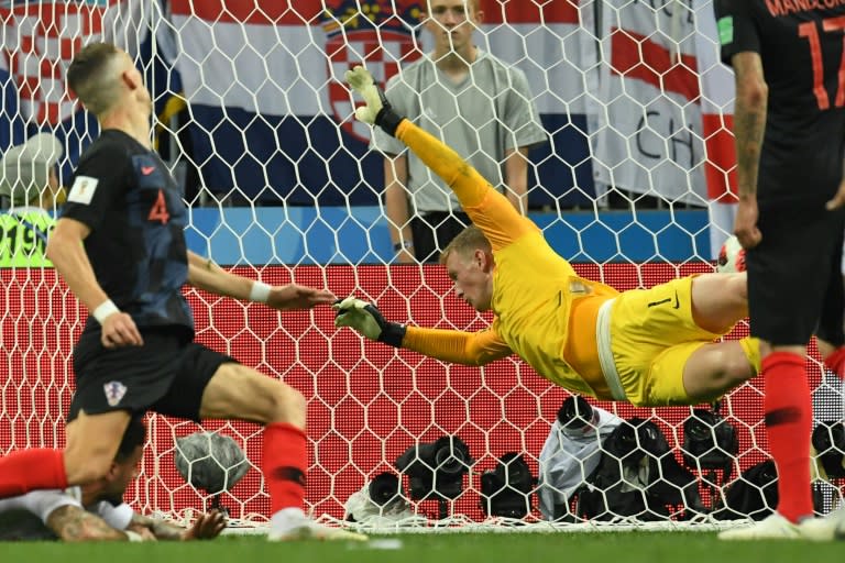 Croatia forward Ivan Perisic scores past England's Jordan Pickford during their World Cup semi-final in Moscow