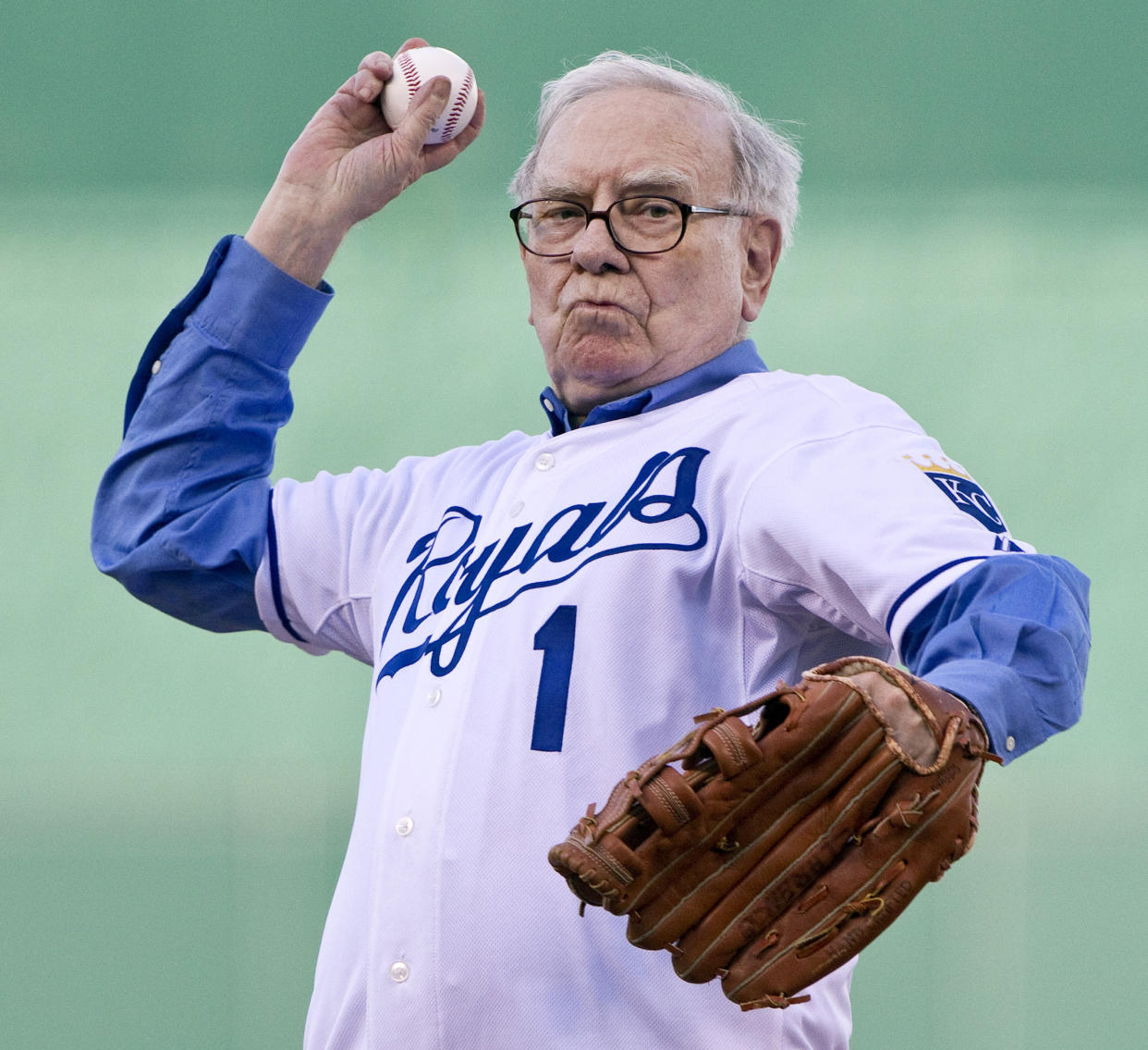 Berkshire Hathaway's Chairman Warren Buffett throws out the ceremonial first pitch before the Kansas City Royals play host to the Houston Astros at Kauffman Stadium in Kansas City Missouri, on Thursday, June 17, 2010.  (Photo by John Sleezer/Kansas City Star/Tribune News Service via Getty Images)