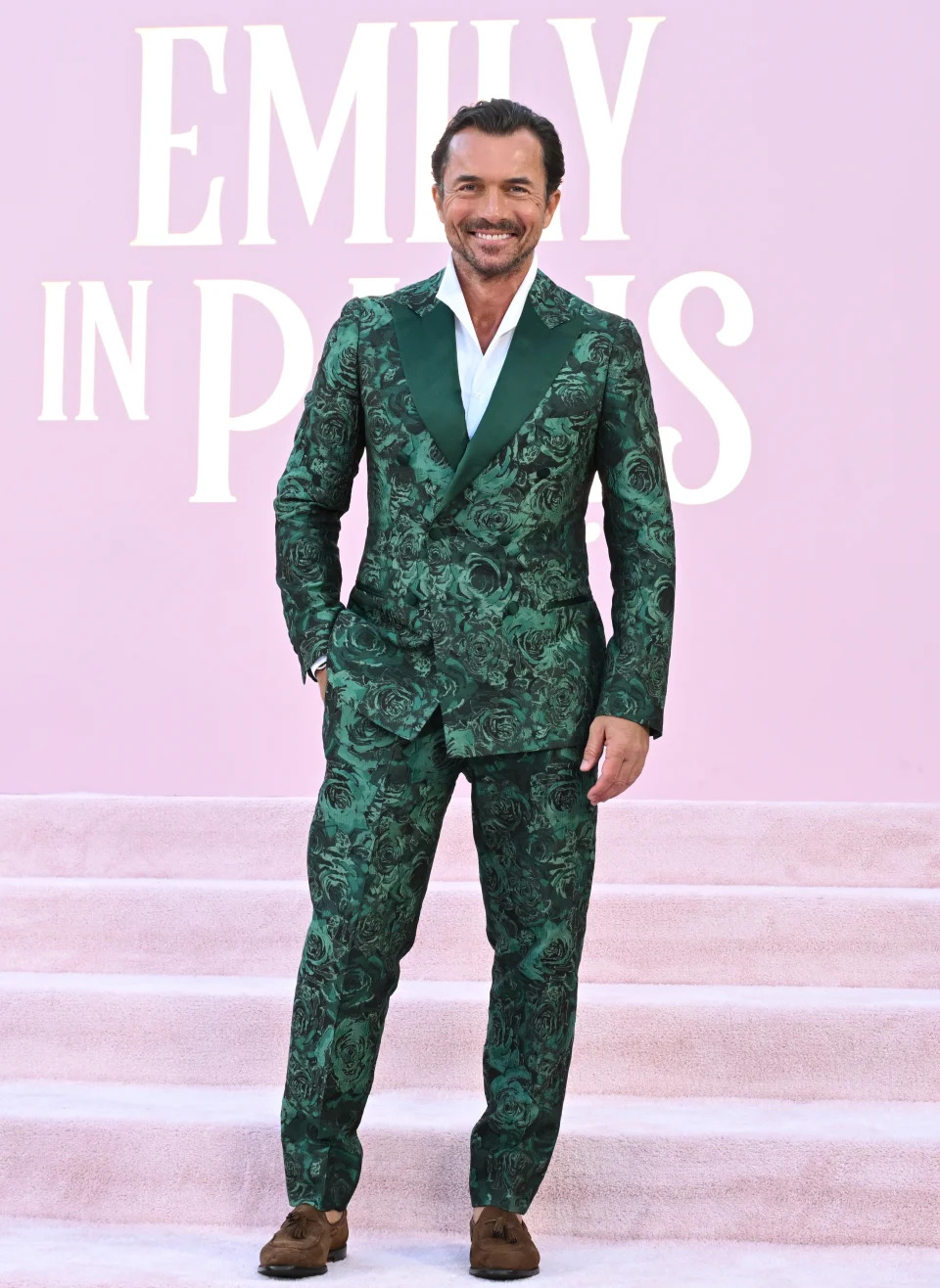 William Abadie in a floral suit at the premiere of "Emily in Paris"