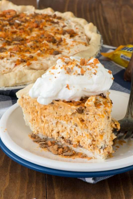 <p>Crazy For Crust</p><p>Every bite tastes just like the candy bar.</p><p><strong>Get the recipe: <a href="https://www.crazyforcrust.com/easy-butterfinger-pie-recipe/" rel="nofollow noopener" target="_blank" data-ylk="slk:Easy Butterfinger Pie;elm:context_link;itc:0;sec:content-canvas" class="link rapid-noclick-resp">Easy Butterfinger Pie</a></strong></p>