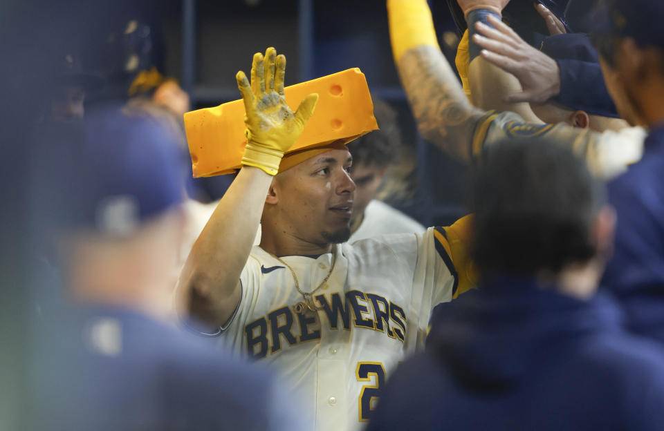 Milwaukee Brewers catcher William Contreras reacts after his home run against the Detroit Tigers during the first inning of a baseball game Monday, April 24, 2023, in Milwaukee. (AP Photo/Jeffrey Phelps)