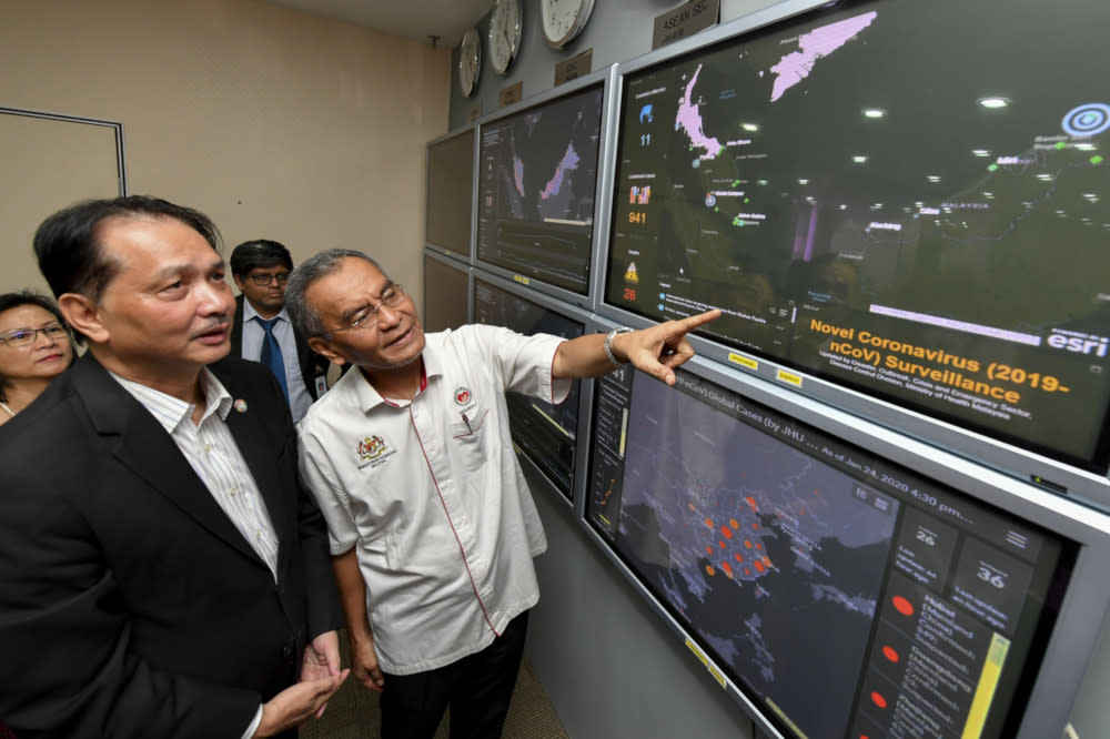 Health Minister Datuk Seri Dzulkefly Ahmad monitors the status of the virus’ spread in Malaysia and around the world after a press conference on the novel coronavirus in Putrajaya January 25, 2020. With him is Health D-G Datuk Dr Noor Hisham Abdullah. — Bernama pic