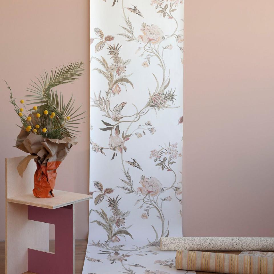 Large-patterned wallpaper broadens the feel of a room