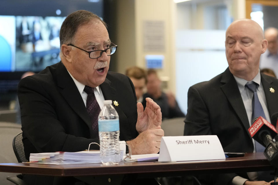 FILE - Sagadahoc Country Sheriff Joel Merry responds to questioning, Jan. 25, 2024, in Augusta, Maine, during a hearing of the independent commission investigating the law enforcement response to the mass shooting in Lewiston, Maine. Sgt. Aaron Skolfield, a Maine sergeant whose actions prior to the Lewiston mass shooting were criticized by an investigatory panel, has pulled papers to run for sheriff. Skolfield is running for county sheriff against his boss, Merry. (AP Photo/Robert F. Bukaty, File)