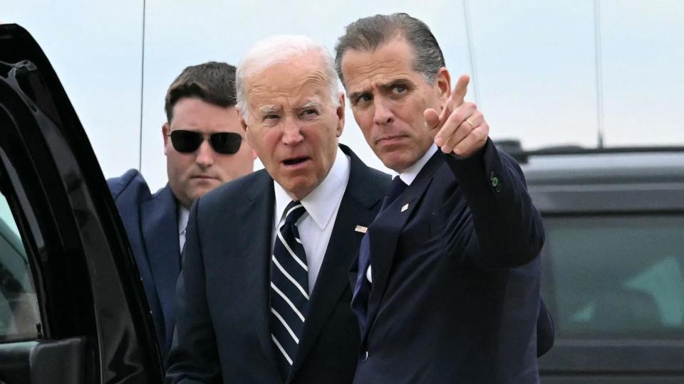 PHOTO: President Joe Biden talks with his son Hunter Biden upon arrival at Delaware Air National Guard Base in New Castle, Del., on June 11, 2024, as he travels to Wilmington, Del. (Andrew Caballero-Reynolds/AFP via Getty Images)
