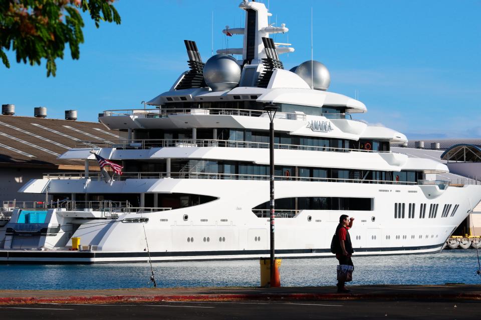 The superyacht Amadea is moored in Honolulu on Thursday, June 16, 2022. A Russian-owned superyacht seized by the United States arrived in Honolulu Harbor flying a U.S. flag after the U.S. last week won a legal battle in Fiji to take the $325 million vessel.