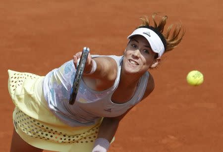 Tennis - French Open - Roland Garros - Myrtille Georges of France v Garbine Muguruza of Spain - Paris, France - 25/05/16. Garbine Muguruza returns a shot. REUTERS/Jacky Naegelen