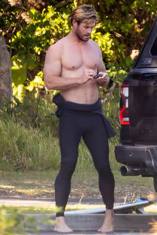 <p>Splash News</p> Thor actor Chris Hemsworth turns 40 today (August 11) and was spotted out celebrating with his younger brother Liam Hemsworth, with the acting duo heading out for a morning surf with friends, in Byron Bay.