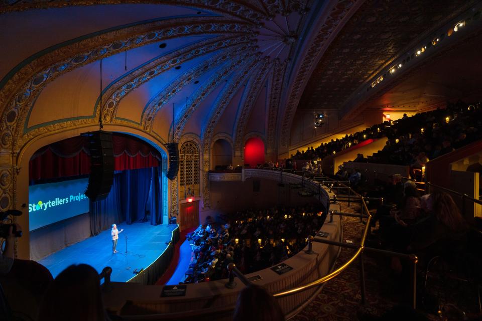 Patsy Shors tells her story during the Des Moines Storytellers Project's "Generosity" show at Hoyt Sherman Place in Des Moines.