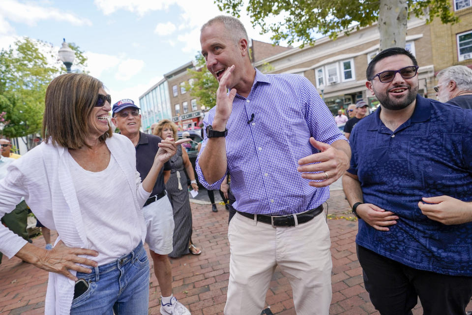 New York 17th Congressional District Democratic primary candidate Rep. Sean Patrick Maloney, left, greets supporters during his campaign's early voting kickoff rally, Saturday, Aug. 13, 2022, in Peekskill, N.Y. (AP Photo/Mary Altaffer)