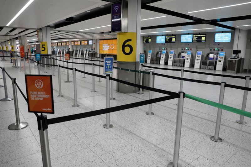 An almost empty check-in area is seen at Gatwick Airport, amid the coronavirus disease (COVID-19) outbreak, in Crawley