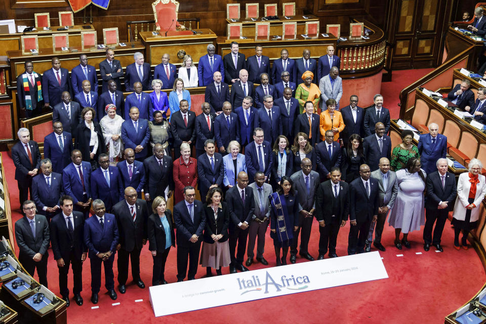 Italian Premier Giorgia Meloni, top center, poses with African leaders and dignitaries at the Senate for the start of an Italy - Africa summit, in Rome, Monday, Jan. 29, 2024. Meloni opened a summit of African leaders on Monday aimed at illustrating Italy's big development plan for the continent that her government hopes will stem migration flows and forge a new relationship between Europe and Africa. (Roberto Monaldo/LaPresse via AP)