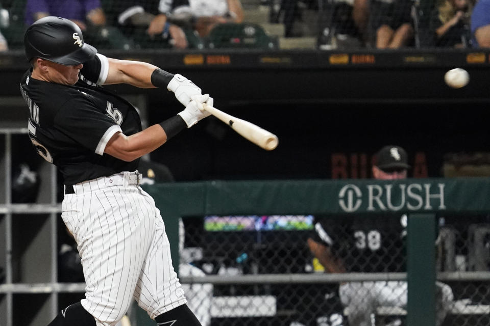 Chicago White Sox's Andrew Vaughn hits a ground-rule double during the fourth inning of a baseball game against the Minnesota Twins in Chicago, Friday, Sept. 2, 2022. (AP Photo/Nam Y. Huh)