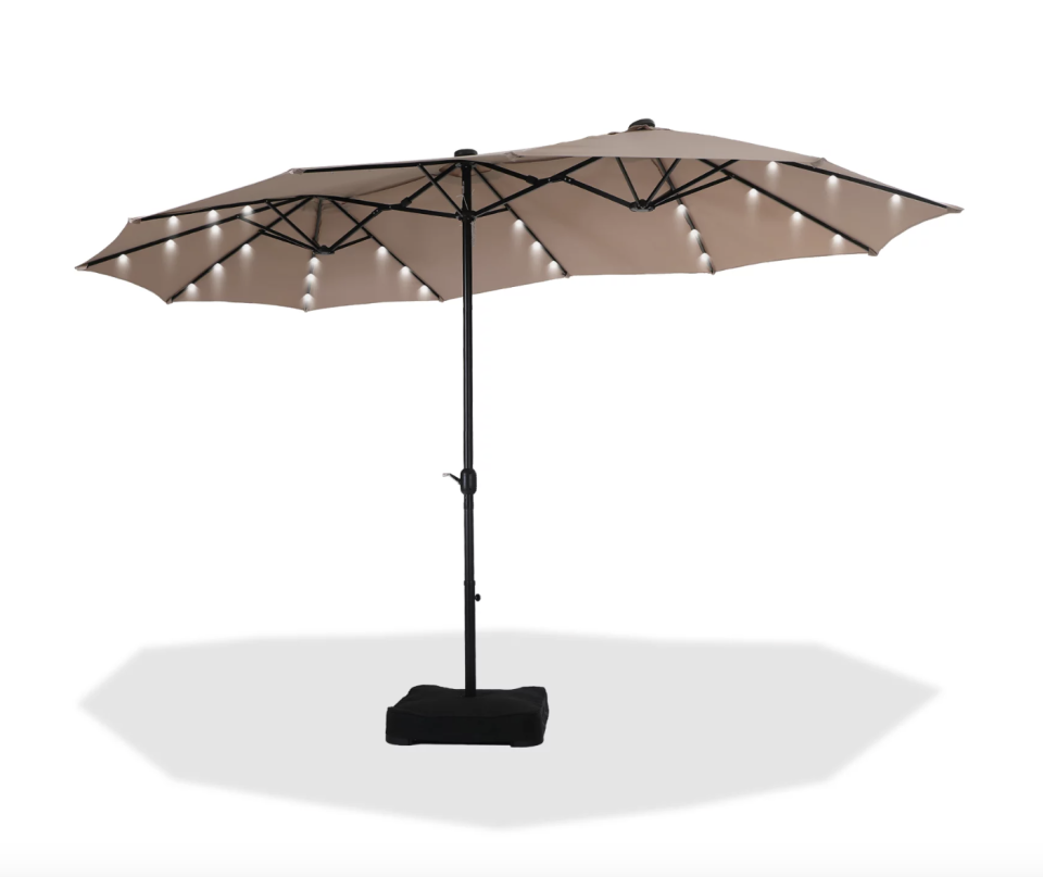<p><a href="https://go.redirectingat.com?id=74968X1596630&url=https%3A%2F%2Fwww.walmart.com%2Fip%2FMF-Studio-15ft-Double-Sided-Solar-Patio-Umbrella-with-Base-Large-Outdoor-Table-Umbrella-with-Crank-Handle-and-36-pcs-LED-lights-Beige%2F950084194&sref=https%3A%2F%2F" rel="nofollow noopener" target="_blank" data-ylk="slk:Shop Now;elm:context_link;itc:0;sec:content-canvas" class="link ">Shop Now</a></p><p>15ft Double-Sided Solar Patio Umbrella </p><p>$159.99</p><p>walmart.com</p><span class="copyright">MF Studio/Walmart </span>