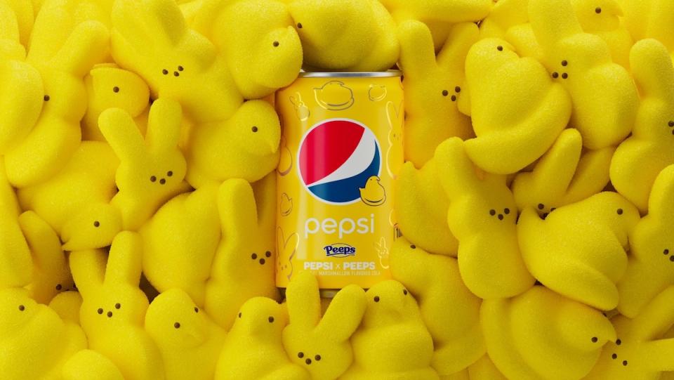 A yellow can of Pepsi x Peeps surrounded by yellow bunny Peeps candy