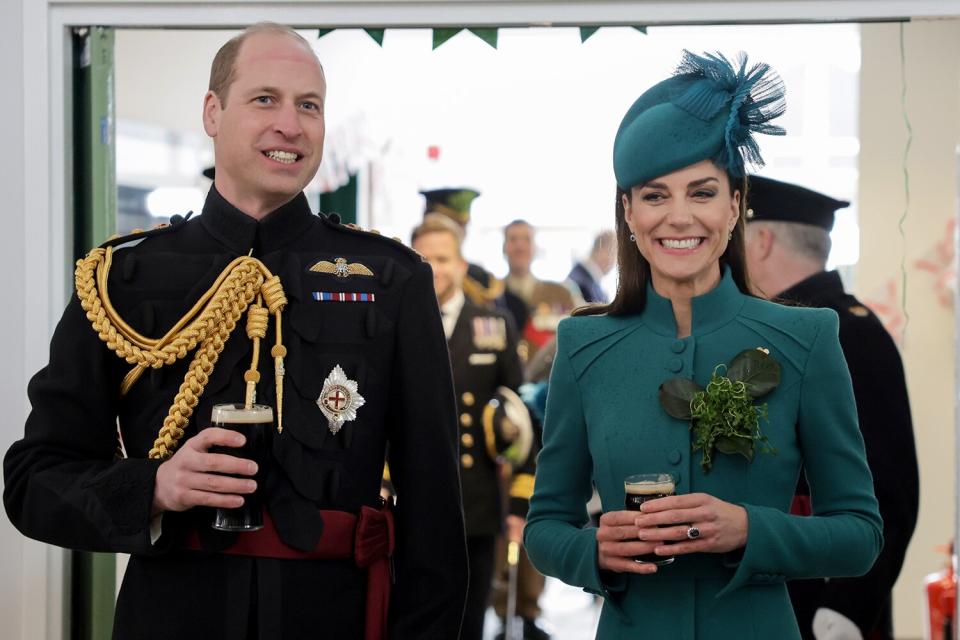 Prince William, Prince of Wales and Catherine, Princess of Wales laughing and enjoying a glass of Guinness after the St. Patrick's Day Parade