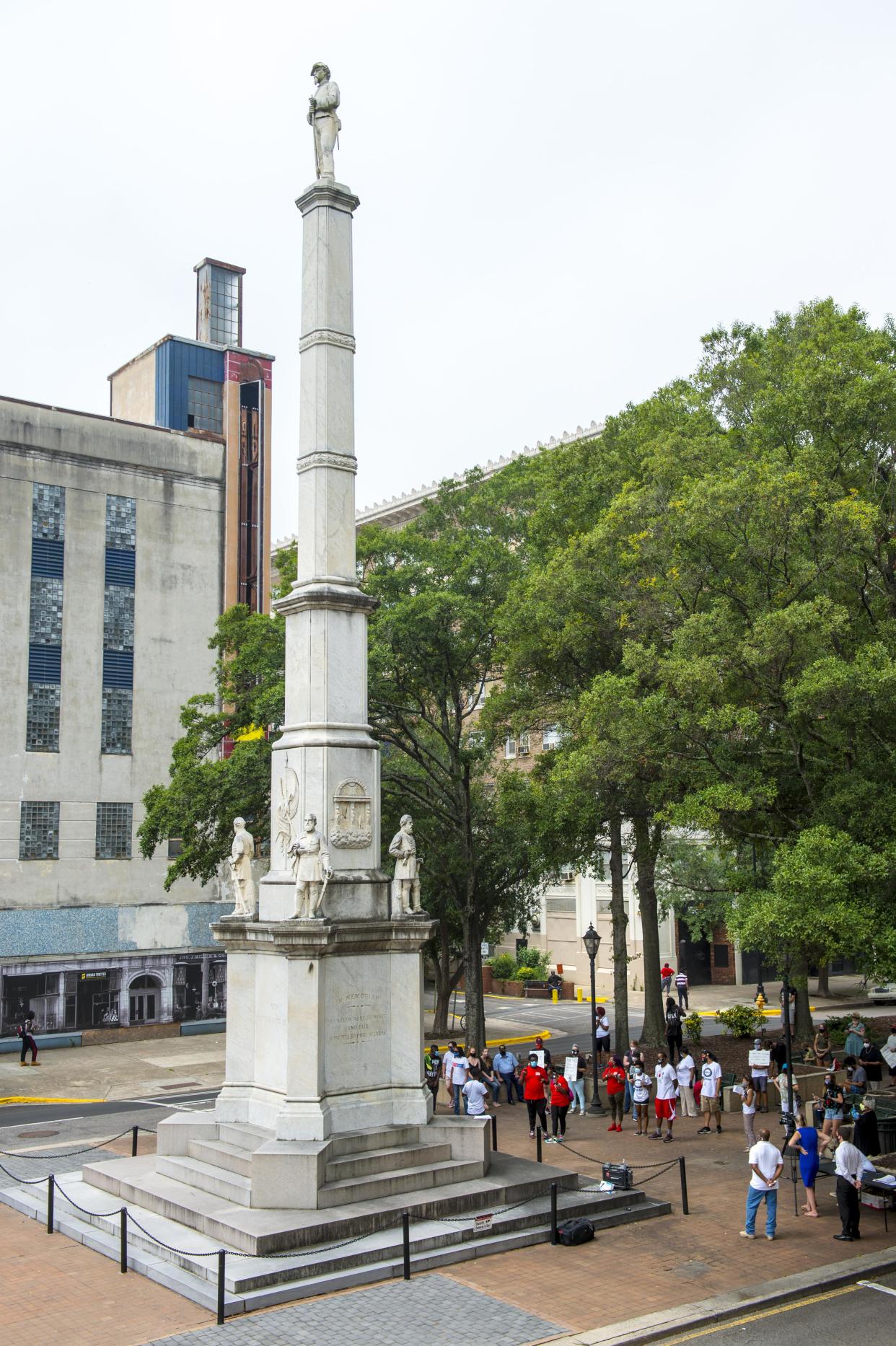 Protesters rally for removal of the Confederate monument from the Broad Street median in Augusta Aug. 8, 2020.