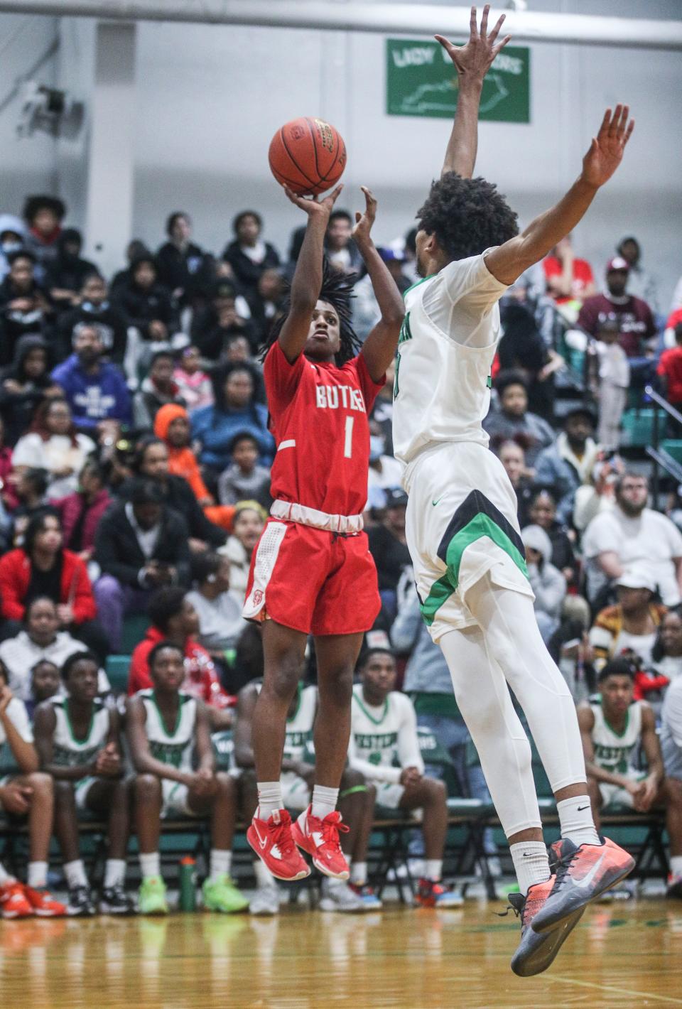 Butler's Dontre Russell shoots a three over Western's Jayden Miles during the first half in the double-overtime game. Feb 3, 2023